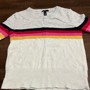 Half cream/grey colorful sweatshirt.